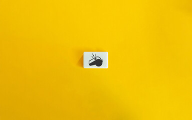 Whistleblower Policy and Anti-retaliation Concept Image. Whistle Icon on Block Letter Tile on...