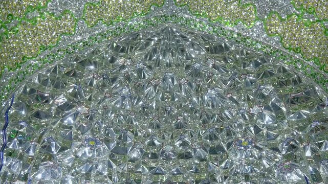 Ali Ibn Hamza Mausoleum closeups of textures in mirrors and gravel surfaces