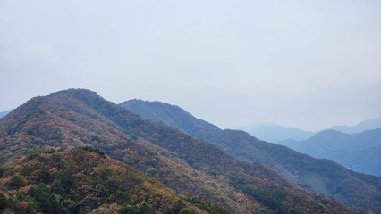 magnificent mountain landscape. Hiking and mountaineering. Mountain paths and stone steps. peak. Seasons in the mountains: autumn - winter - spring - summer. Hiking in the mountains