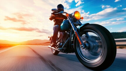 Naklejka premium Motorcycle Rider on Open Road at Sunset