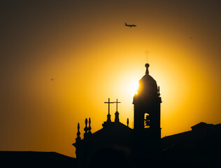 Silhouettes at sunset over the Portuguese city of Porto.