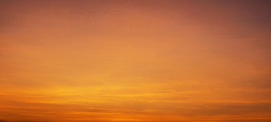 beautiful orange sky with a few clouds