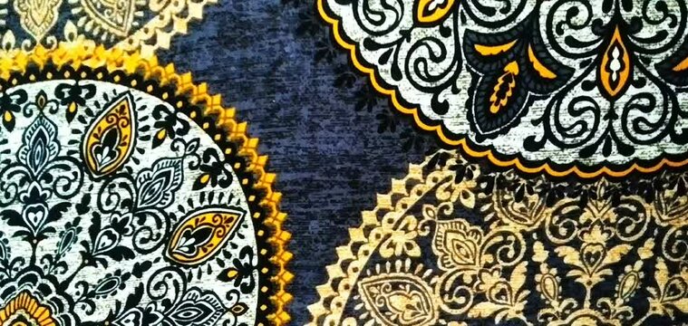 Bohemian mandala pattern on dark blue velvet fabric, luxury oriental textile background, elegant gold and black damask ornament