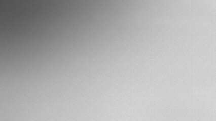 A textured, gray gradient background with a subtle spotlight effect. The gradient transitions smoothly from a dark charcoal gray to a light, almost white tone.