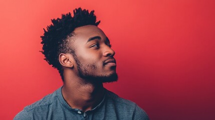 Obraz premium Confident Man Against Solid Red Background