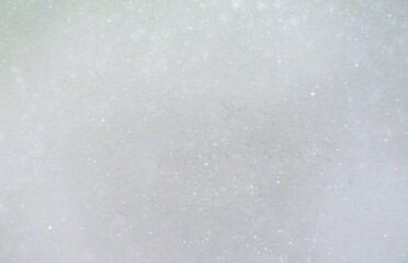 Frothy foam from a fire extinguisher. Firefighting foam background.