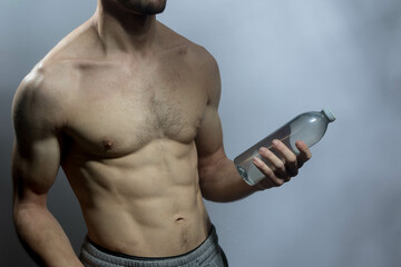 A young shirtless muscluar man