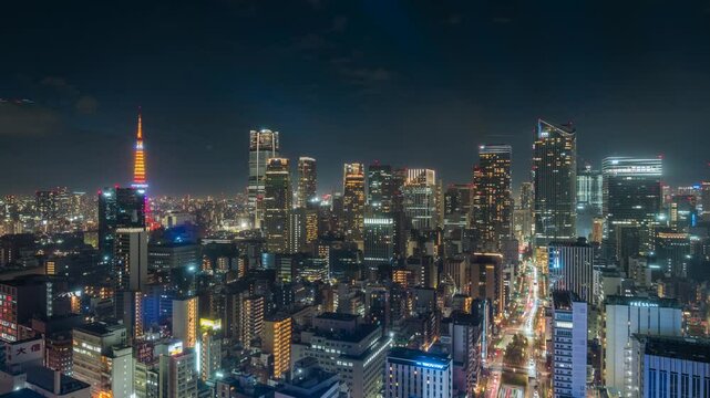 Dusk to night timelapse view of Tokyo cityscape in the Minato District of central Tokyo, Japan.