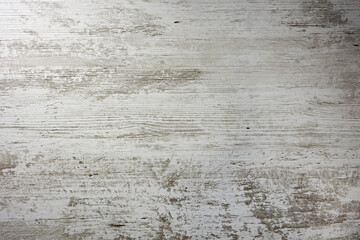 Obraz premium Close-up texture of wooden panel with cracks faded from time.