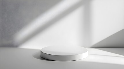 A Bright and Minimalist Studio Setting with a White Ceramic Podium for Beauty or Tech Product Displays