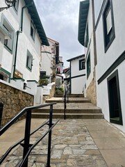 Characteristic whitewashed houses  in the old port  in Algorta,  Getxo Spain,  municipality of the Basque country of Bilbao Spain. No people