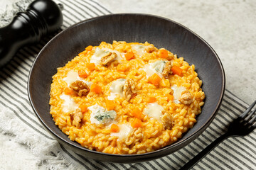 Pumpkin Risotto with Gorgonzola Cheese and walnuts.