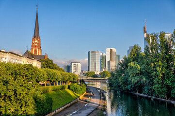 Naklejka premium Frankfurt, Germany - July 29, 2024: The city skyline of Frankfurt in the early morning 