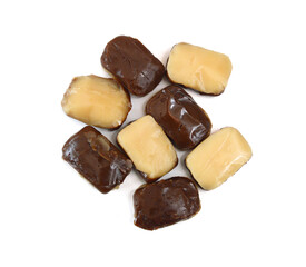 Caramel candies isolated on white background