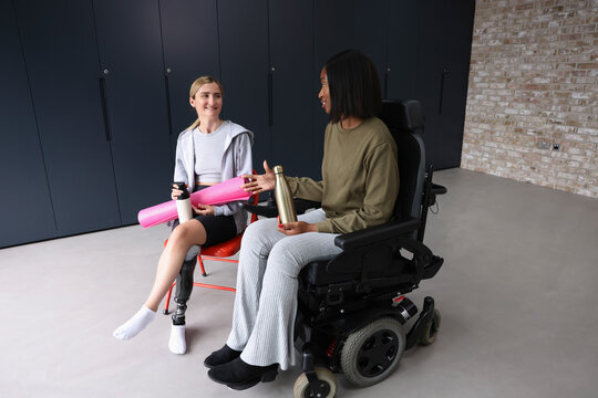 Two women sitting and talking