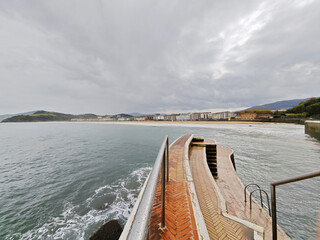 Obraz premium The view of the pier in Zarautz, the Basque country, Spain