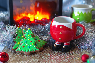 colorful gingerbread cookies and a cup of hot chocolate.