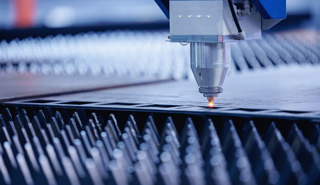 Laser CNC cut of metal on industry factory, industrial aerospace modern technology