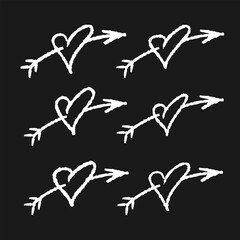 Six hand drawn hearts pierced by an arrow. White on black. Doodles and squiggles. Vector set