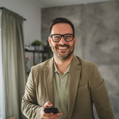 Adult man businessman use break from work to use mobile phone
