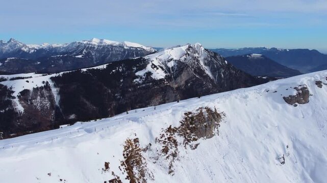 Monte Agaro mountain which is part of the Lagorai chain in Trentino. Winter period at the Brocon pass. Snow-capped mountain peak.