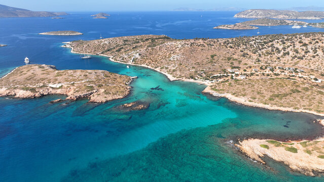 Aerial drone photo of paradise blue lagoon and sandy beaches of Tiganakia bay forming a complex of small islets in island of Arkoi or Arki, Dodecanese, Greece