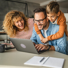 father work from home whit his wife and son