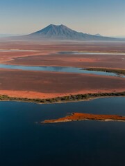 Aerial view of serene Lake Natron with surrounding mountains in Tanzania.