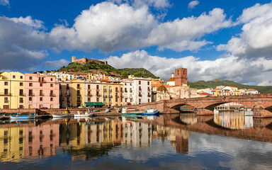 View of the picturesque town of Bosa with its colorful houses reflected in the Temo River....