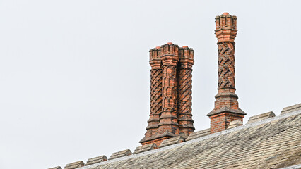Decorative Tudor brick chimneys. London, England, United Kingdom. 15 September 2024
