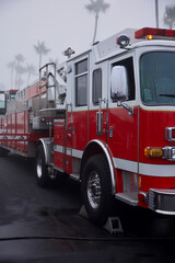 hook and ladder fire truck in the fog