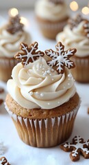 Delicious holiday cupcakes with creamy frosting and gingerbread snowflake decoration