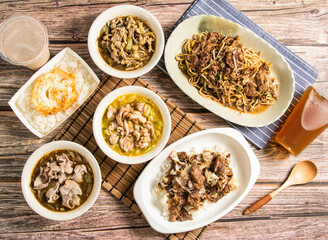 Beef braised noodles,Beef and black pepper risotto,Chicken curry rice,Pork and black pepper risotto,Lamb and black pepper risotto,boiled rice and egg,bubble green tea,milk tea top view of taiwan food
