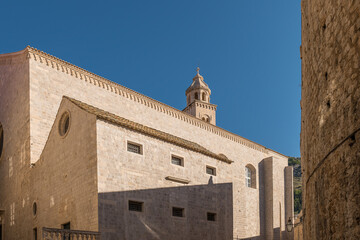 Fototapeta premium Dubrovnik stone church with a bell tower. Medieval churches