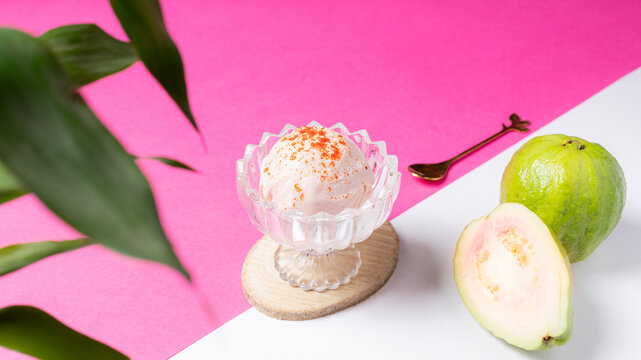 Chopped Guava beside ice cream bowl