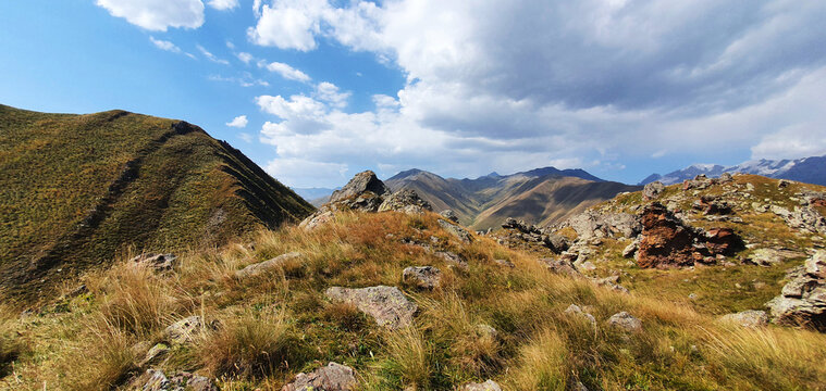 Mountainous surroundings of Kazbegi, Georgia; Mountains near Stepancminda; Mountainous Georgian landscape