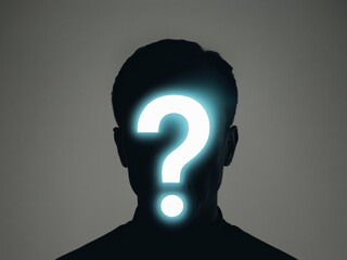Silhouette of a man with illuminated question mark on face.