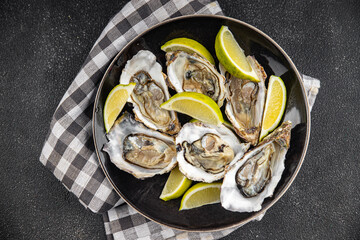 Oysters fresh seafood tasty food dish gourmet food background on the table rustic food top view copy space top view pescetarianism diet