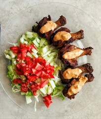alitas de pollo con esnalada