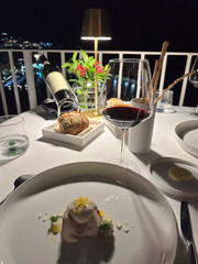 Elegant Romantic Dinner in Sorrento Italy with Wine and Gourmet Food at Night Overlooking the Mediterranean Coast