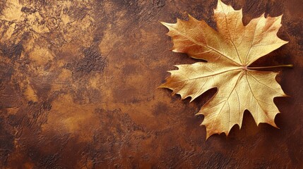 "Golden Maple Leaf on Rustic Background"