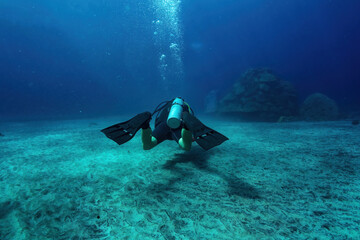 Discover the underwater world as a scuba diver explores bali's tropical seas. Surrounded by...