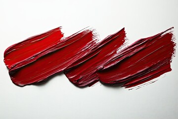 An energetic stroke of red oil paint on a white background. The texture of the paint creates an effect of depth and volume. Ideal for creating bright accents in design.