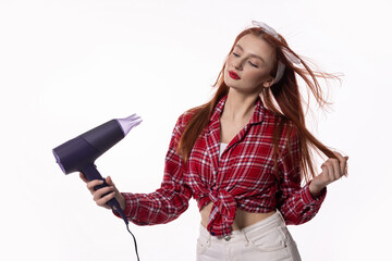 Naklejka premium A Stylish Model Utilizing a Hair Dryer to Achieve the Perfect Look for Her Hair and Style
