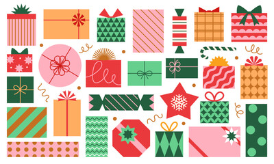 Vector set of different colorful Christmas gift boxes isolated on white background. Modern mid century clip art of present boxes in red, green, pink and gold colors.