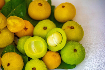 Ripe edible wild fruit from the Brazilian cerrado biome, fruit known as cagaita (Stenocalyx dysentericus) of the Magnoliopsida class and the Myrtaceae family.
