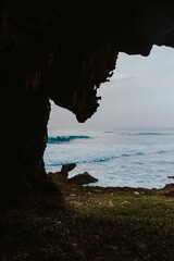 Cliff by the ocean on the beach