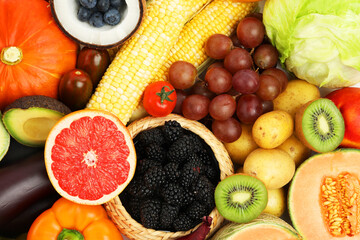 Different fresh vegetables and fruits as background, top view