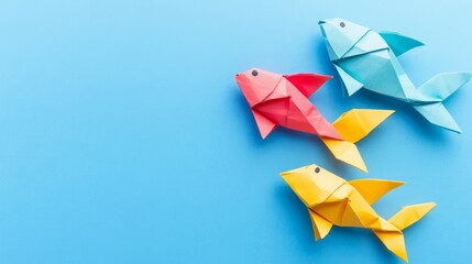 Colorful Origami Fish on Blue Background