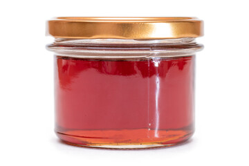 Dark Honey in a Small Glass Jar Isolated on White Background